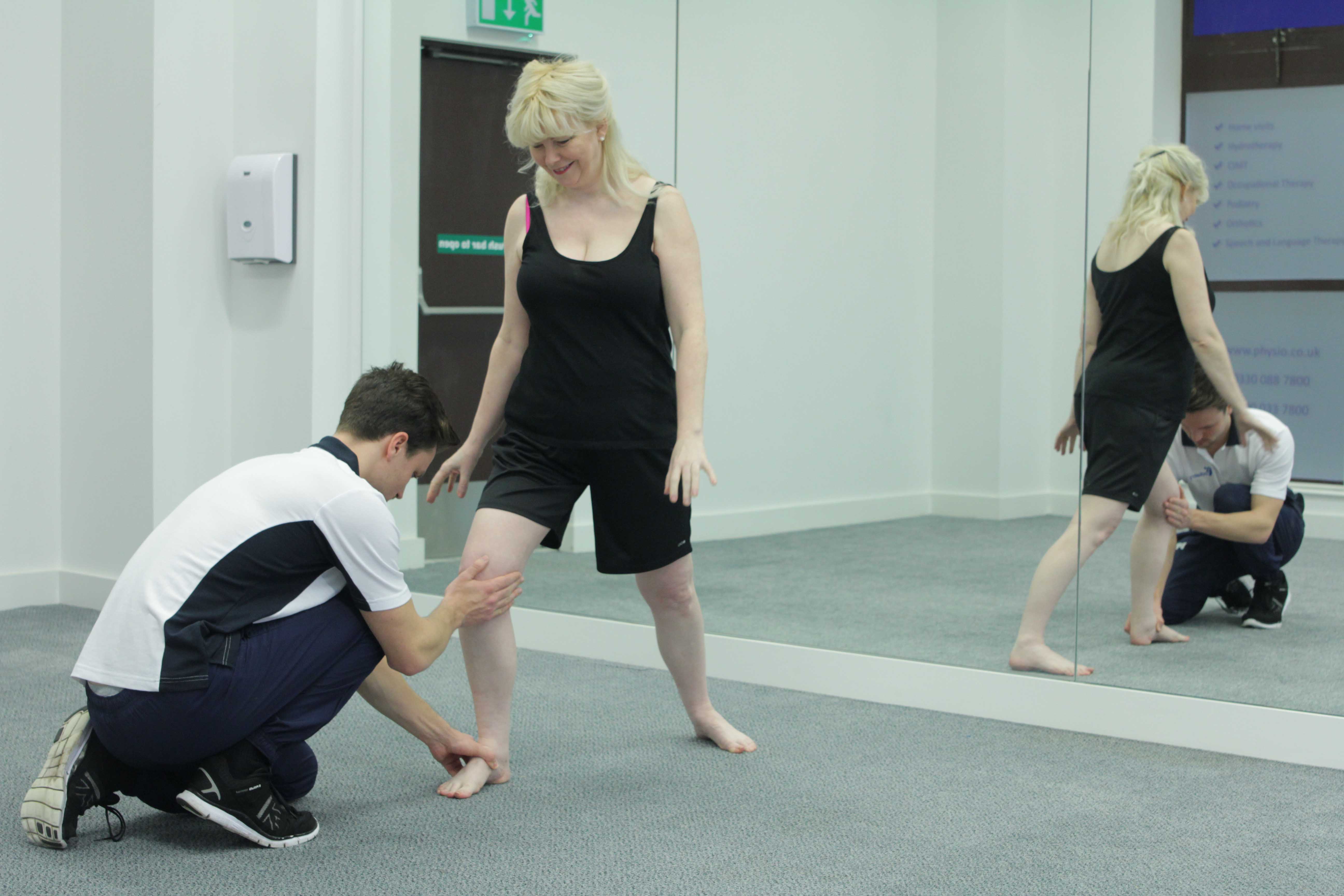 One of our physiotherpaists assessing akle stability following a sprain