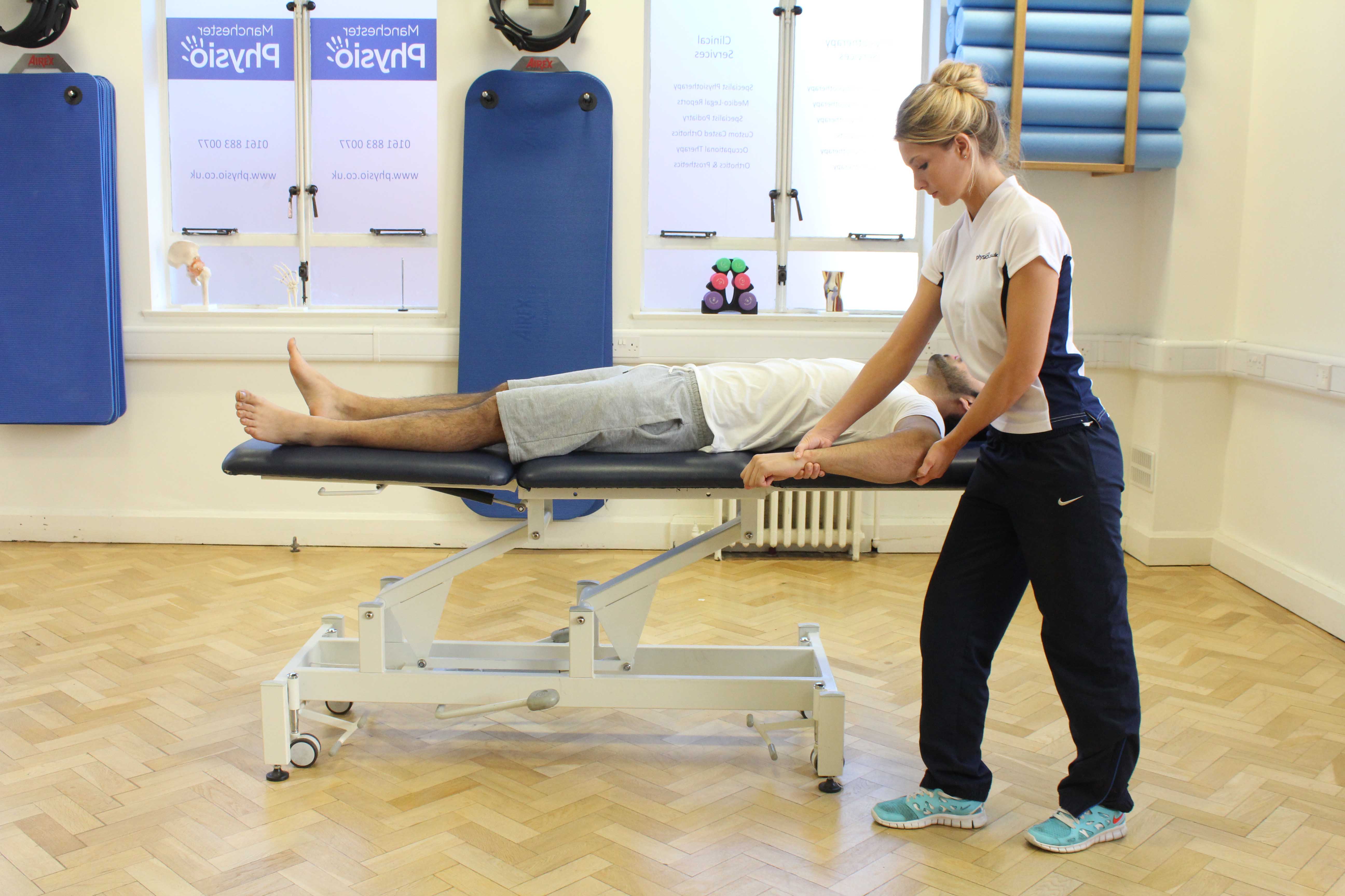 Our physiotherapist providing treatment for shoulder dislocation